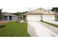 Two-unit home with attached garages at 2616 Kinsale Ln, Ormond Beach, FL 32174