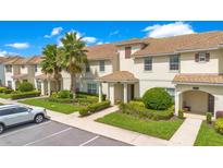Townhouses with attractive landscaping and parking at 4805 Clock Tower Dr, Kissimmee, FL 34746