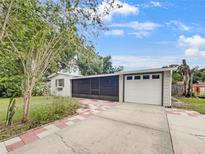 Charming Ranch home with attached garage and walkway at 171 Ronnie Dr, Altamonte Springs, FL 32714