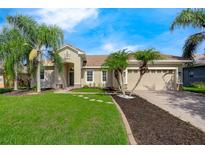 Single-Gathering home with two-car garage and landscaping at 3404 Great Pond Dr, Kissimmee, FL 34746