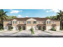 Modern townhouses with two-car garages and neutral colors at 1480 Isleta Loop, Kissimmee, FL 34741