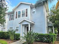 Two-story house with landscaped yard at 5354 Diplomat Ct # 105, Kissimmee, FL 34746