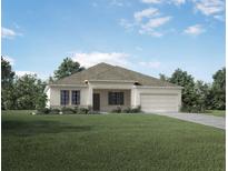 Single-story home with a two-car garage and well-maintained landscaping at Unknown Arthur Ave, Edgewater, FL 32141
