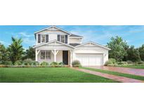 Two-story craftsman style home with a two car garage at 2651 Arbor Dune Ave, Apopka, FL 32712
