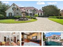 Luxury estate home with pool and fountain at 9011 Pinnacle Cir, Windermere, FL 34786