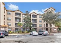 Multi-story apartment building with ample parking at 1301 Tuscan Ter # 9303, Davenport, FL 33896