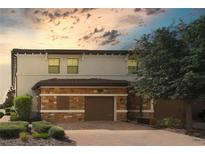 Beautiful two-story home with a two-car garage at 8544 Zoeller Hills Dr, Davenport, FL 33896