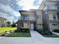 Modern two-story townhome with balcony at 3219 Brasilia Ave, Kissimmee, FL 34747