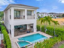 Luxury home with private pool and outdoor kitchen at 837 Desert Mountain Ct, Reunion, FL 34747