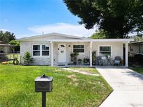 Charming one-story home with stone facade and covered porch at 240 People St, Maitland, FL 32751