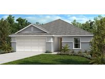 One-story home with gray siding, two car garage, and landscaping at 3433 Narrows Dr, Lakeland, FL 33810