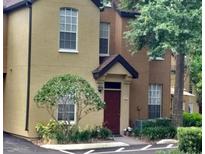 Exterior view of a two-story townhome at 6320 Raleigh St # 604, Orlando, FL 32835