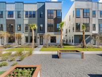 Modern townhouses with landscaped grounds at 2122 Whitney Marsh Aly, Orlando, FL 32804