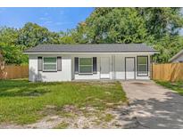 Newly renovated two-unit home with a driveway at 828 27Th Nw St, Winter Haven, FL 33881