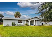 Charming ranch home with a large grassy yard at 8342 Starr Dr, Orlando, FL 32818