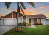 Updated 2 bed, 2 bath home with a landscaped lawn and attached garage at 137 Birmingham Dr, Kissimmee, FL 34758
