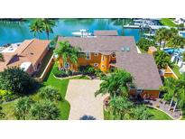 Luxury waterfront home with private dock and boat at 102 Via Duomo, New Smyrna Beach, FL 32169