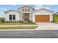Modern two-story home with attached garage at 197 Valencia Ridge Dr, Auburndale, FL 33823