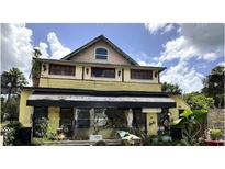Two-story building with a unique facade at 195 Railroad Ave, Osteen, FL 32764