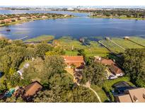 Luxury home nestled on a large lot with stunning lake views at 8605 Bay Shore Cv, Orlando, FL 32836