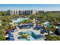 Aerial view of resort-style pool and water features at 14501 Grove Resort Ave # 1219, Winter Garden, FL 34787