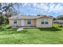 Newly remodeled home with small front yard at 5351 E Johnson Ave, Haines City, FL 33844