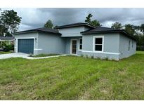 Single-Gathering home with attached garage and modern facade at 3325 Sw 165Th Loop, Ocala, FL 34473