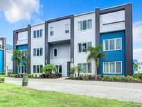 Modern three-story building with a contemporary design at 7770 Sandy Ridge Dr # 18-129, Reunion, FL 34747