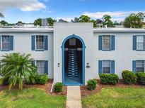 Two-story building with blue-trimmed windows at 1008 Plantation Dr # F15, Kissimmee, FL 34741