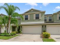 Two-story house with attached garage at 3349 Rodrick Cir, Orlando, FL 32824