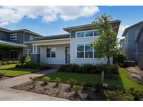 Modern house exterior with gray and white siding at 14663 Englert Aly, Orlando, FL 32827