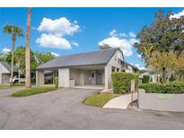 Single-story home with carport and walkway at 899 Jonathan Way # 899, Altamonte Springs, FL 32701