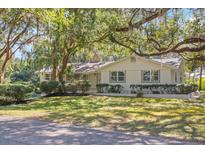 Charming single story home with mature landscaping at 1822 Se 8Th St, Ocala, FL 34471