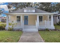 Charming bungalow style home with front porch and walkway at 295 S Oak Ave, Bartow, FL 33830