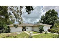 A charming single-story home with a two-car garage at 1501 Fort Smith Blvd, Deltona, FL 32725