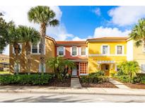 Beautiful two-story townhome with landscaped yard at 3052 Secret Lake Dr, Kissimmee, FL 34747
