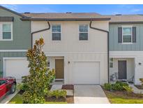 Modern two-story townhome with attached garage at 1024 Appleton St, Davenport, FL 33837