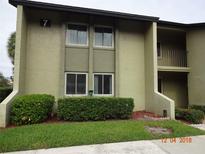 Exterior view of a condo building showcasing building 7 at 11 Escondido Cir # 105, Altamonte Springs, FL 32701