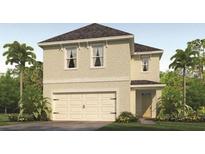 Two-story house with beige siding, two-car garage, and landscaping at 2932 Waterlily Way, Poinciana, FL 34759