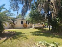 House with deck and backyard at 14902 Arrena Rd, Winter Garden, FL 34787