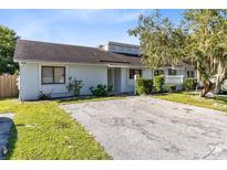 Charming light-blue exterior with a spacious yard at 4621 N Pine Hills Rd # 113, Orlando, FL 32808