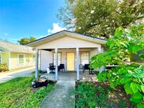 Small cottage with a covered porch at 301 N Westmoreland Dr, Orlando, FL 32805