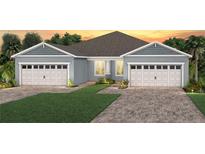 Two-car garage and attractive curb appeal at 13418 Princess St, Winter Garden, FL 34787