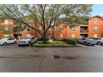 Attractive red brick building with ample parking and landscaping at 132 Vista Verdi Cir # 220, Lake Mary, FL 32746