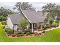 Single-story home with a landscaped yard and stone accents at 2823 Deerfield St, Saint Cloud, FL 34771