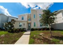 Modern two-story home with stone accents and landscaping at 2816 Simile St, Kissimmee, FL 34746