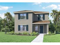 Two-story house with gray siding, dark shutters, and a brown roof. Landscaped yard with palm trees at 1668 Hummingbird Rd, Winter Haven, FL 33884