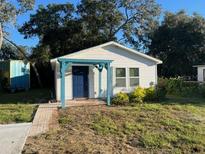 Newly built home with a charming front porch and walkway at 0000 157Th St, Umatilla, FL 32784