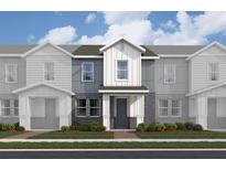 Modern two-story townhome with gray and brick facade at 159 Aulin Ave, Oviedo, FL 32765