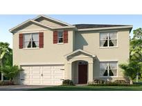 Two-story house with two-car garage and landscaping at 3681 Rory Oak Cir, Apopka, FL 32703